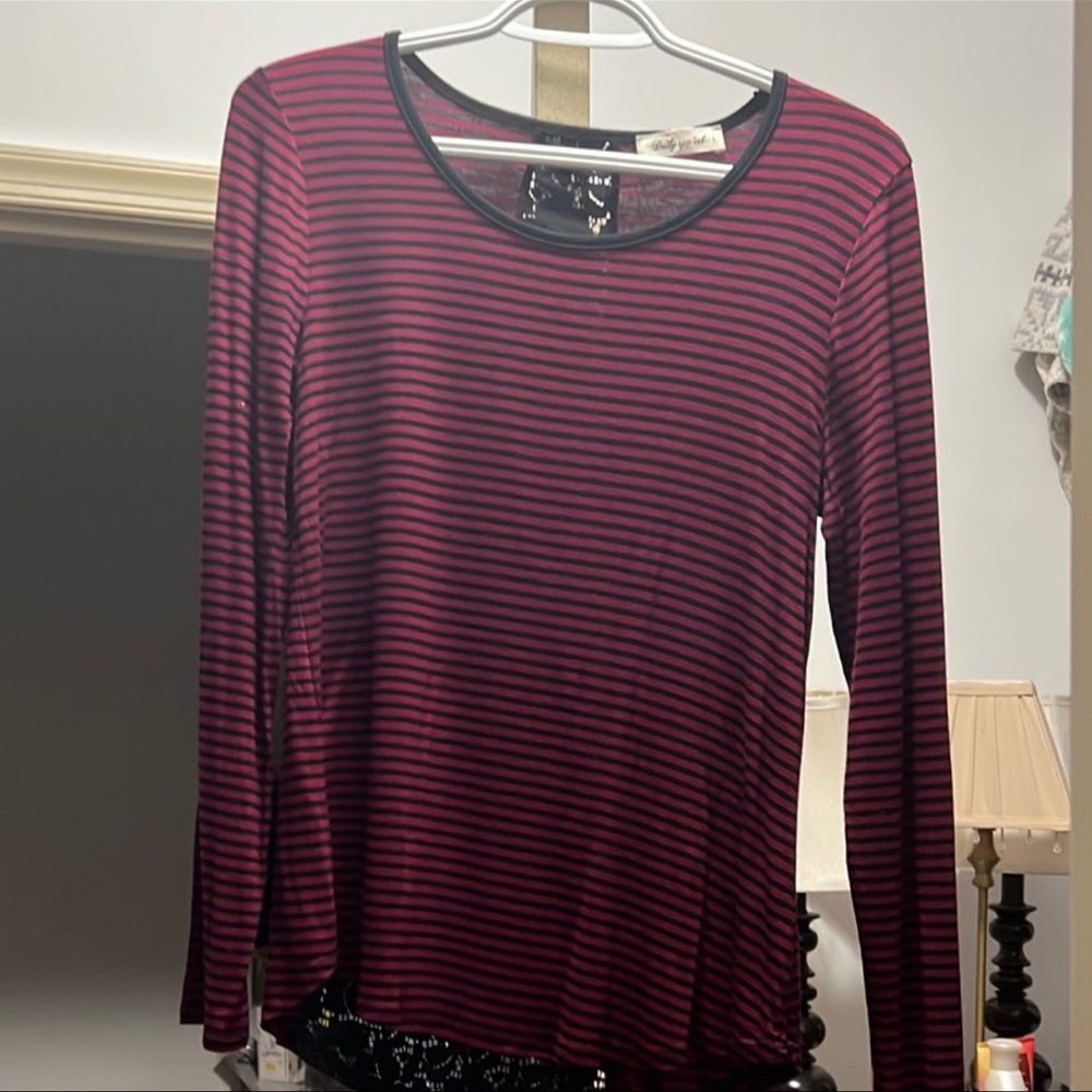 Wine colored long sleeve shirt. Semi- see through back design. Never been worn.